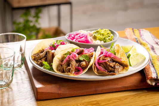 Lamb Barbacoa Tacos with Pickled Red Onions